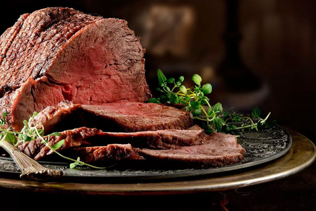 Sliced roast beef with thyme on a pewter platter at The Plough